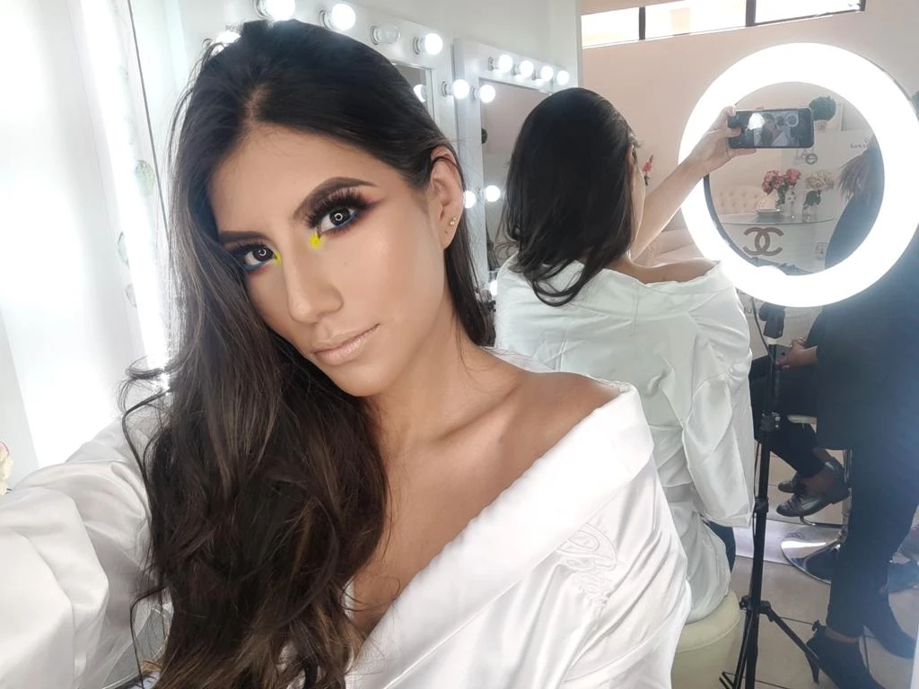 Behind the scenes of a beauty shoot with Millen Guerrero in the makeup chair