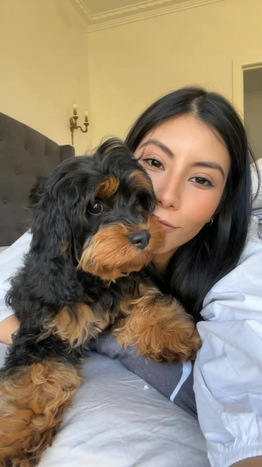 Millen Guerrero at home with her dog for pet lifestyle content